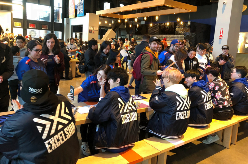 New York Excelsior giving autographs outside the Mets stadium.
